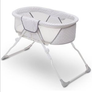 Delta Children EZ Fold Ultra Compact Travel
Bassinet - Gray